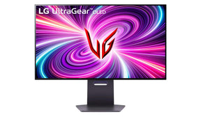 LG 32GS95UE-B Monitor előlnézetben talpon. A kijelzőn lg ultragear oled logó és kékes lila absztrakt fénycsóvák.