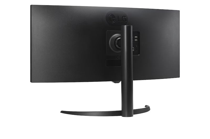LG 34SR65QC-B Monitor hátulnézetben talpon, enyhén balra fordítva.