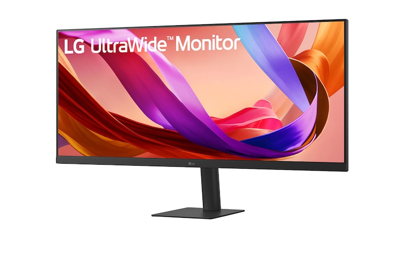 LG 34U511A-B Monitor előlnézetben talpon, enyhén balra fordítva. A kijelzőn lg ultrawide logó.