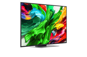 LG 50QNED87A televízió előlnézetben talpon, jobbra fordítva. A kijelzőn színes festékek kavarognak.